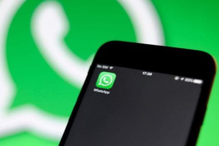 How to report a number on WhatsApp